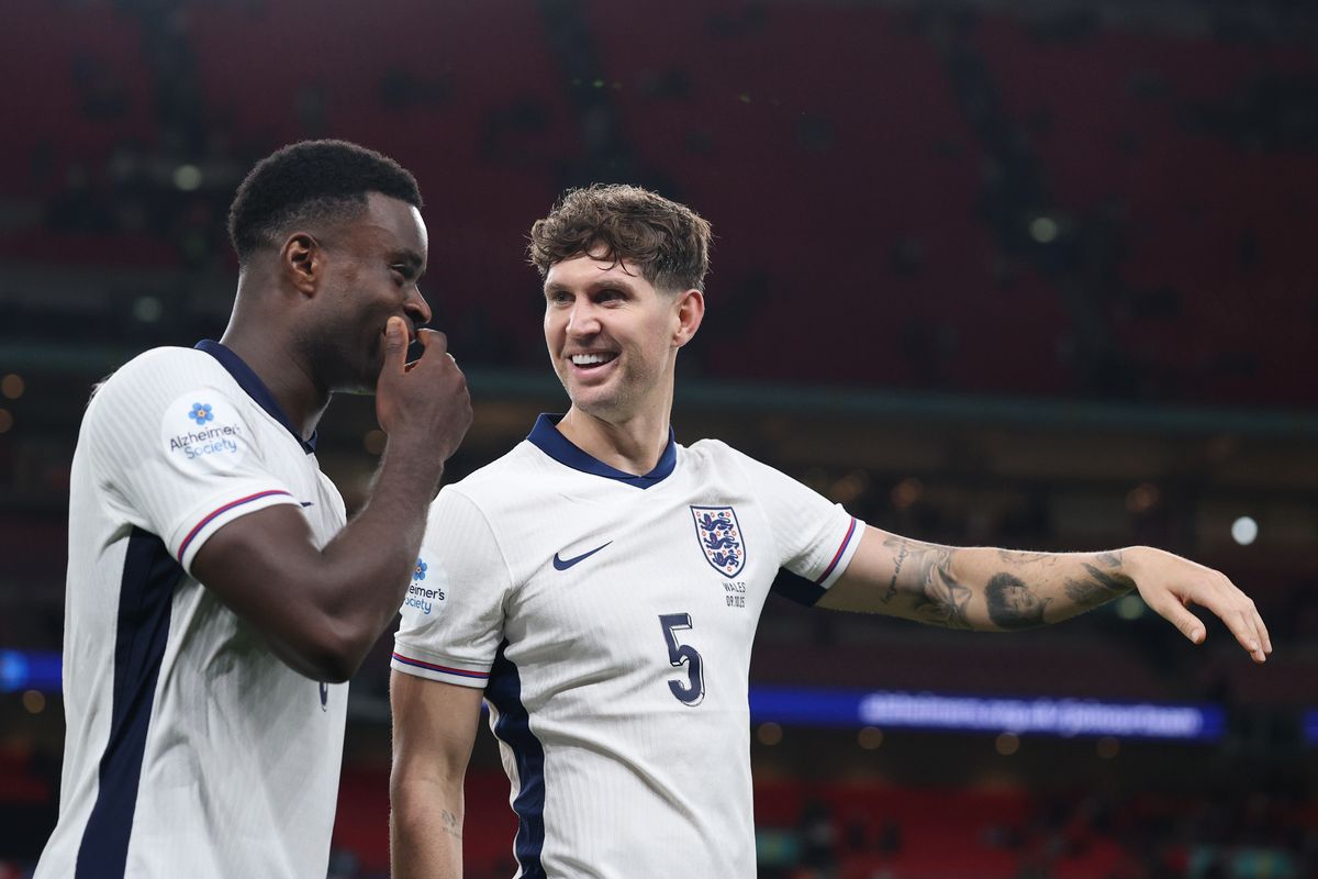 John Stones and Marc Guehi of England talk following the International Friendly between England and Wales at Wembley Stadium on October 09, 2025 in London, England.