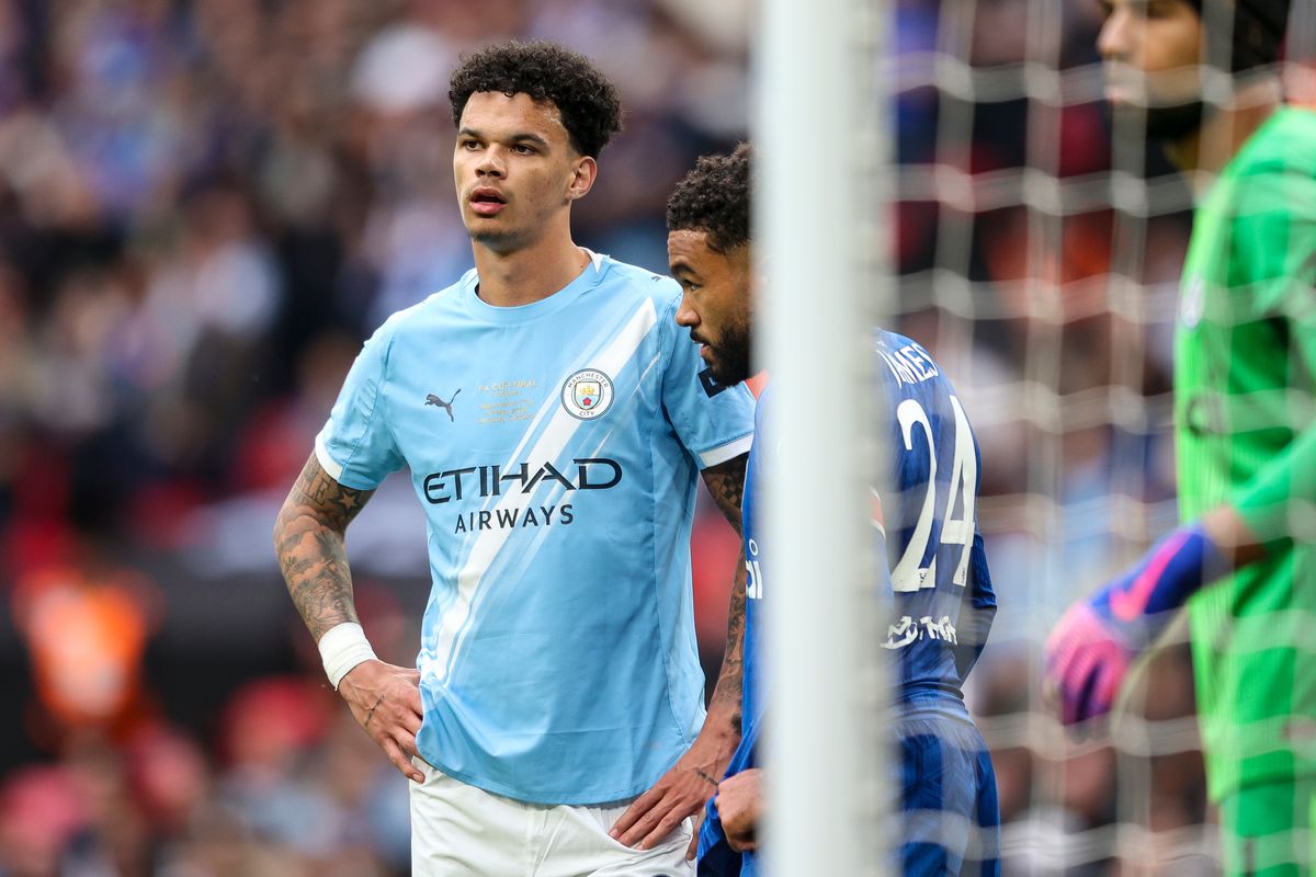 Nico O'Reilly of Manchester City and Reece James of Chelsea during the Emirates FA Cup Final match between Chelsea and Manchester City on May 16, 2026 in London, England.