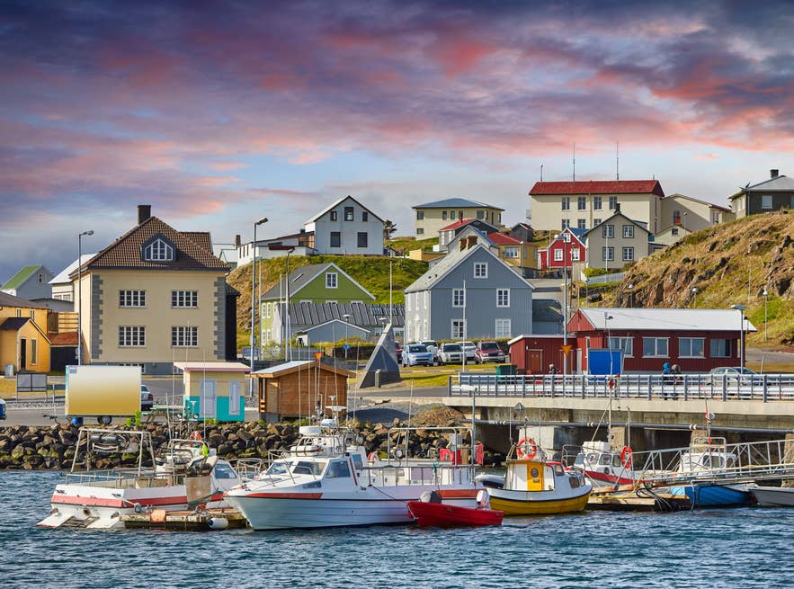 Colorful houses and fishing boats in Stykkisholmur harbor, a must-visit stop when vacationing in Iceland. Colorful houses and fishing boats in Stykkisholmur harbor, a must-visit stop when vacationing in Iceland.