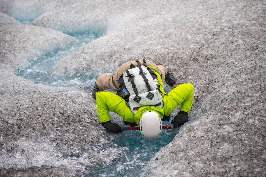 Drinking fresh glacial water during an ice hike in Iceland, a refreshing adventure and one of the best Iceland travel tips. Drinking fresh glacial water during an ice hike in Iceland, a refreshing adventure and one of the best Iceland travel tips.