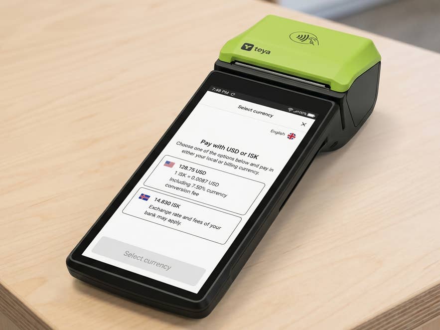 Card payment terminal showing options to pay in USD or ISK in Iceland. Card payment terminal showing options to pay in USD or ISK in Iceland.