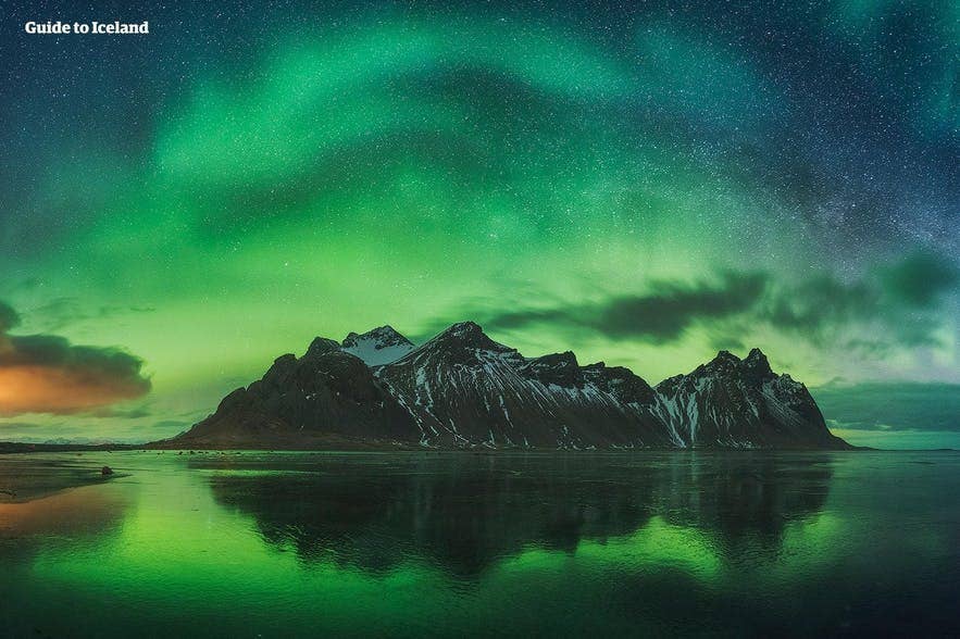 The Aurora Borealis dance above Mount Vestrahorn. The Aurora Borealis dance above Mount Vestrahorn.