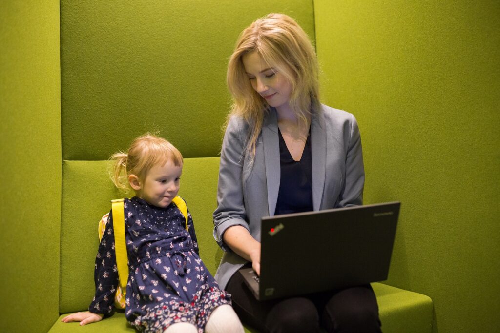 A mother and child in a modern office in Estonia. Photo by Renee Altrov.