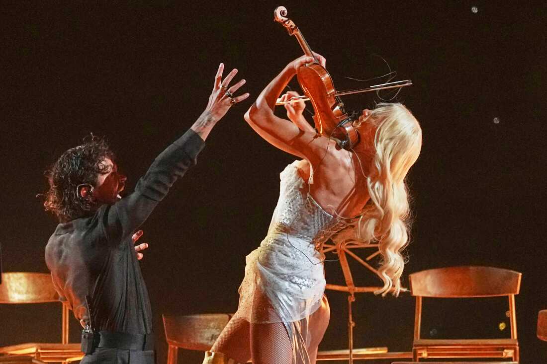 Linda Lampenius and Pete Parkkonen from Finland perform the song "Liekinheitin" during the first semifinal of the 70th Eurovision Song Contest in Vienna, Austria, Tuesday, May 12, 2026.