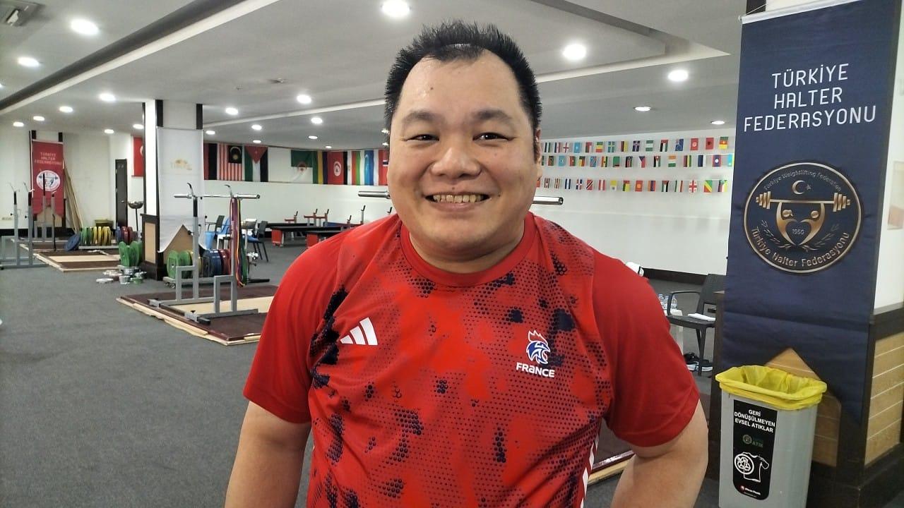 British weightlifter Jon Khoo poses during a training camp at a weightlifting facility in Antalya, Türkiye, May 23, 2026. (AA Photo)