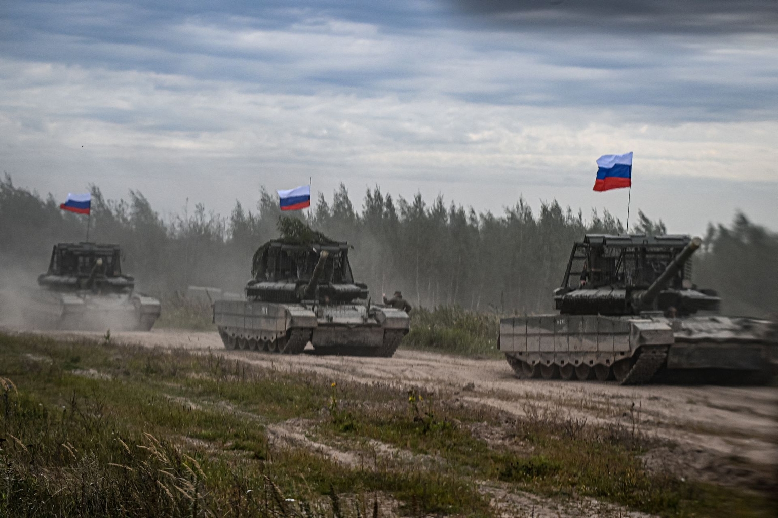 Russian tanks move during the “Zapad-2025” joint Russian-Belarusian military drills at a training ground near the town of Barysaw, east of Minsk, Belarus, on Sept. 15, 2025. 