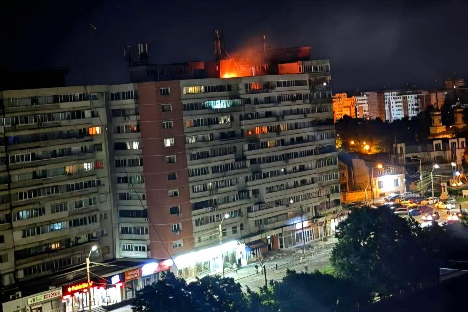 A photo released by Romania's Department for Emergency Situations shows a fire on top of a block of flats after a drone crash caused an explosion and fire on impact, in Galati