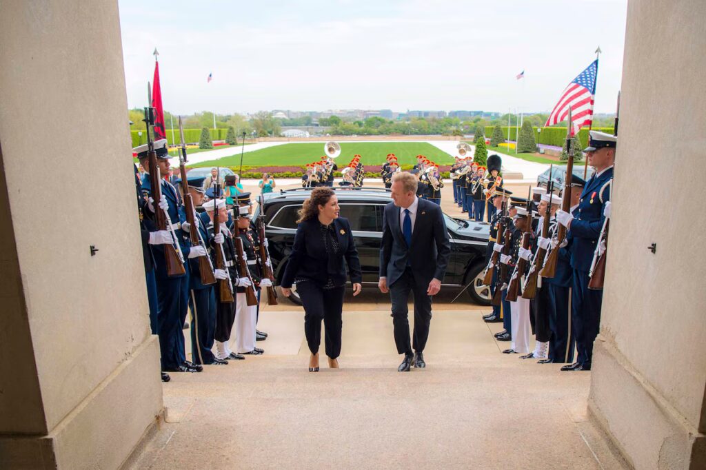 Albanian, U.S. Defense Leaders Reaffirm Relationship at Pentagon > U.S. Department of War > Defense Department News Acting Defense Secretary Patrick M. Shanahan walks up steps with the Albanian defense minister; service members stand on either side.