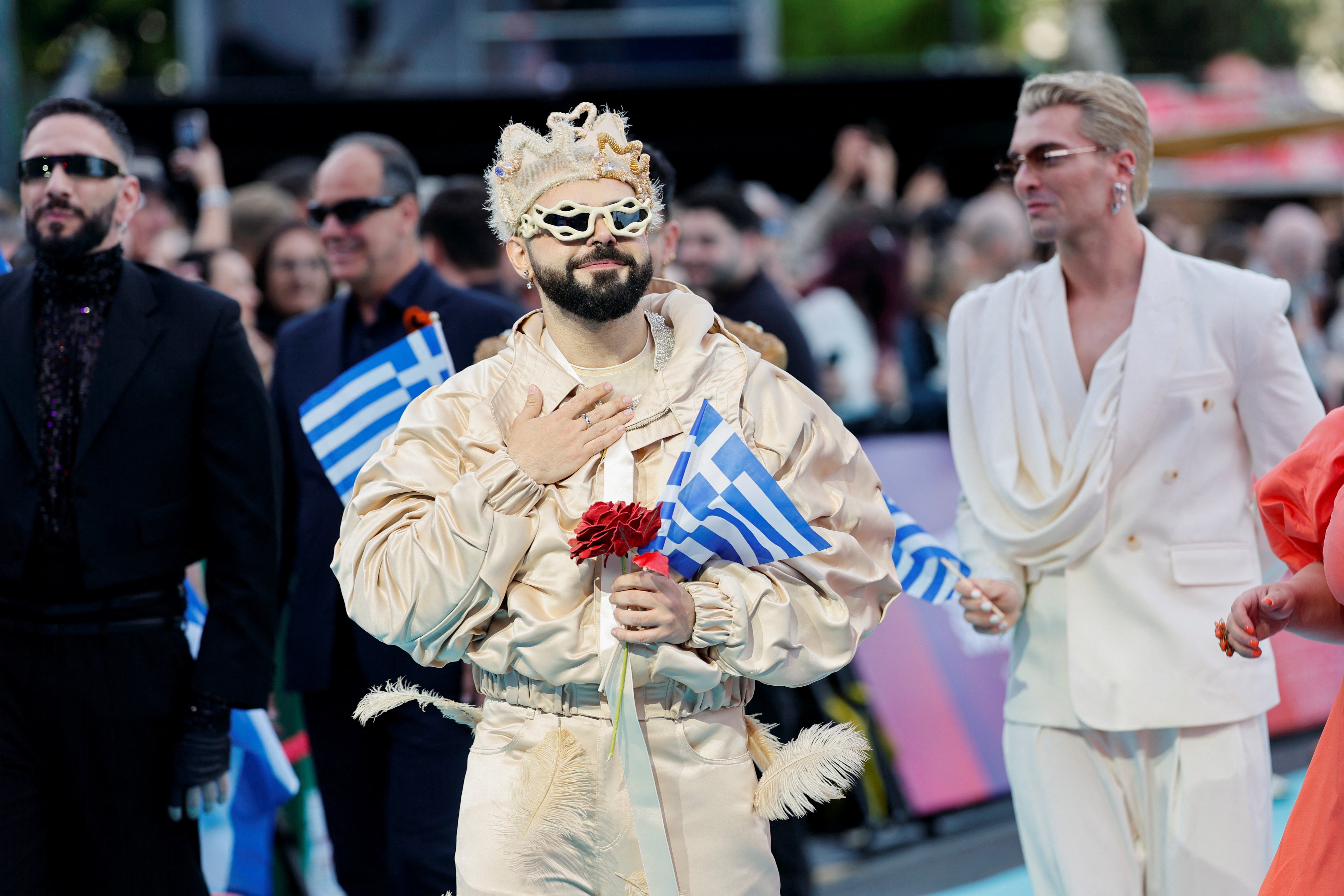 Akylas walking the turquoise carpet in Vienna at the Eurovision Song Contest 2026