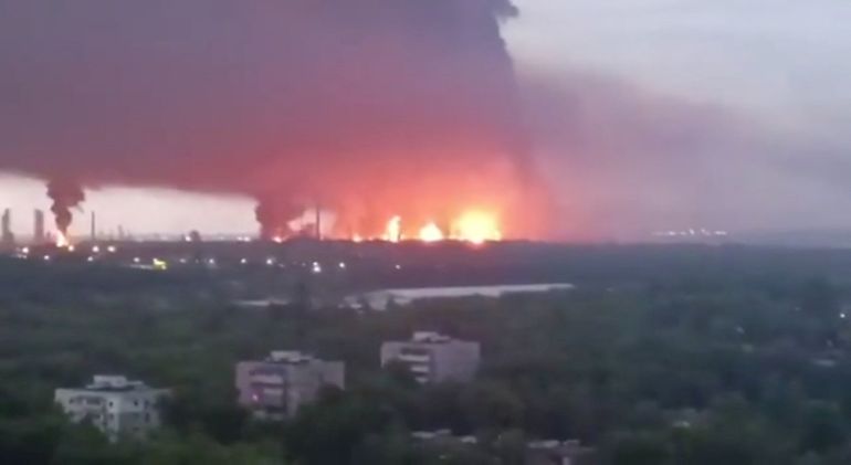 Fire and a plume of smoke rise in the vicinity of the Ryazan oil refinery, May 15, 2026. [Supplied via Reuters]