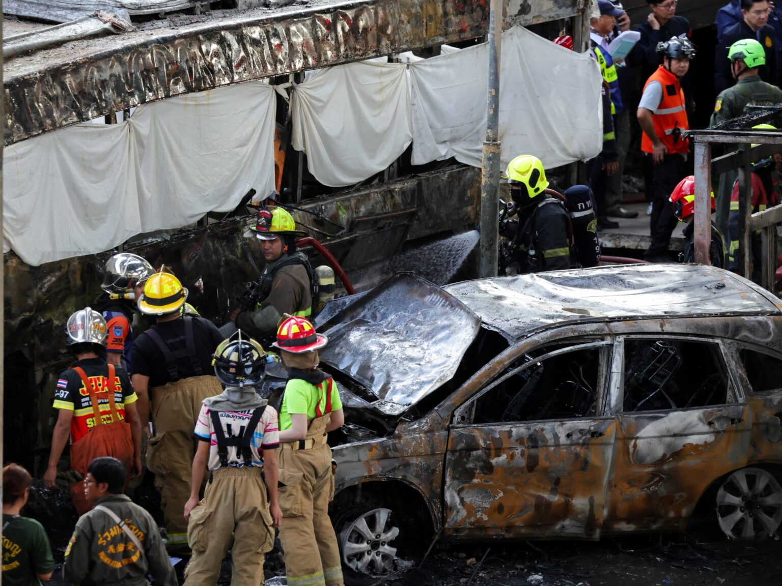 At least eight killed, 35 injured as train hits bus in Bangkok | News