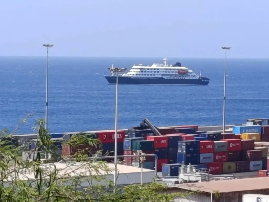 Cruise ship MV Hondius docks off Cape Verde port, as passengers were not allowed off the ship, while health authorities investigated suspected cases of hantavirus aboard the vessel, in Praia Port, Cape Verde, May 4, 2026. (Reuters)