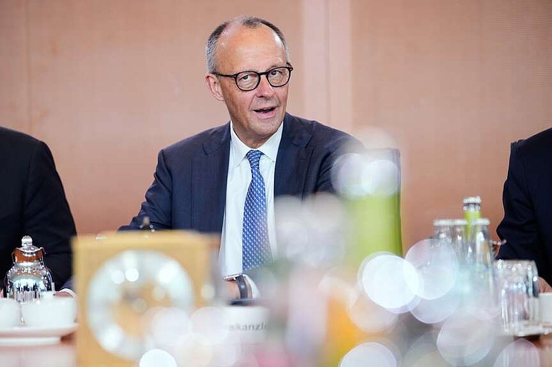 German Chancellor Friedrich Merz attends the cabinet meeting at the chancellery in Berlin, Germany, Wednesday, May 20, 2026. (AP Photo/Ebrahim Noroozi)