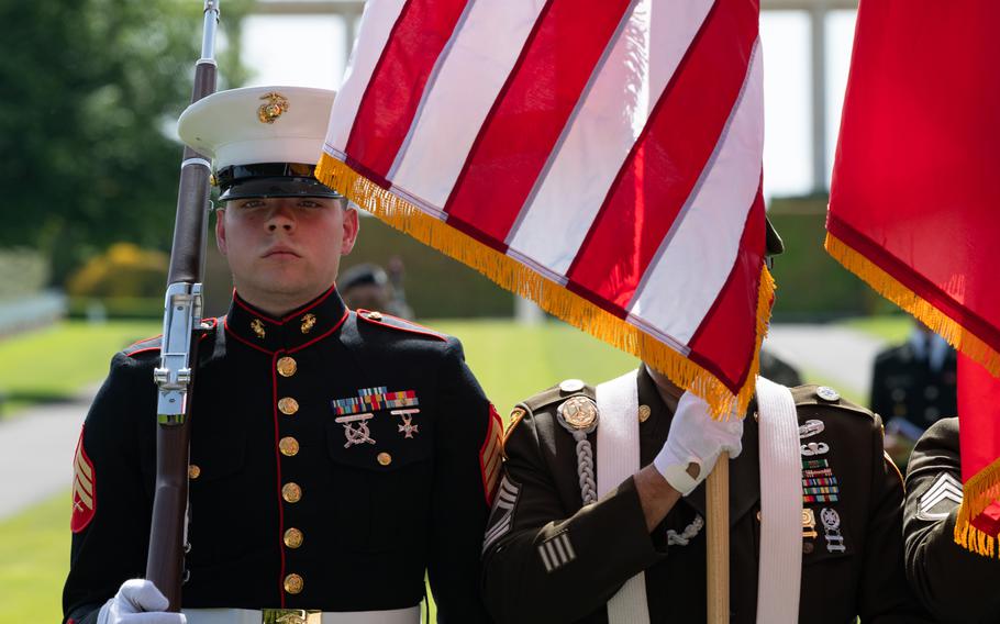 Marine Sgt. Brevyn Nolan, a member of the joint-service EUCOM color guard, participates in a Memorial Day ceremony at Henri-Chapelle American Cemetery in Belgium, May 23, 2026.