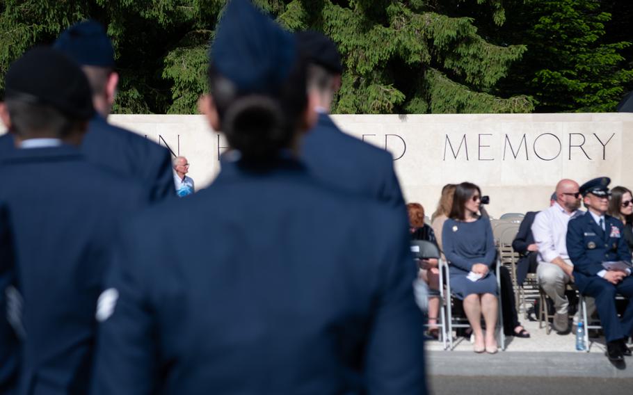 An honor platoon comprised of airmen of the 52nd Fighter Wing, based at Spangdahlem Air Base, in Germany, stood at formation during a Memorial Day ceremony at at Henri-Chapelle American Cemetery in Belgium, May 23, 2026. Nearly 8,000 American World War II troops are buried at the cemetery.