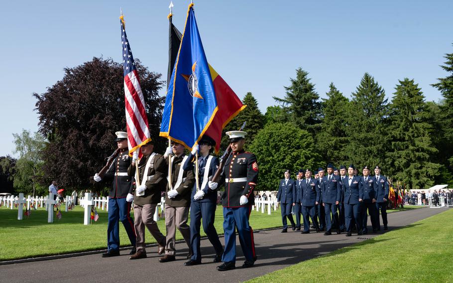 The EUCOM color guard and a 52nd Fighter Wing honor platoon march at a Memorial Day ceremony at Henri-Chapelle American Cemetery in Belgium, May 23, 2026.