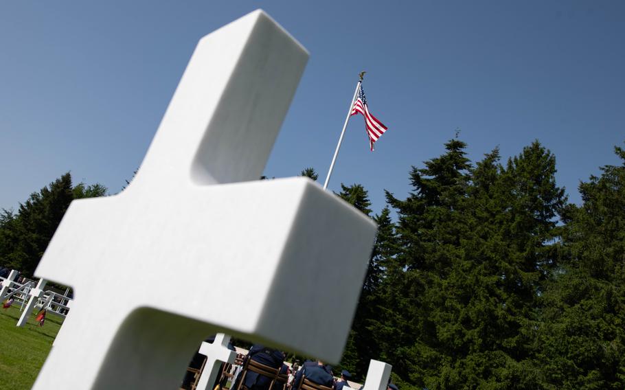 The U.S. flag towers over the headstones of Henri-Chapelle American Cemetery in Belgium, May 23, 2026. Nearly 8,000 Americans who died in World War II are buried at the cemetery.