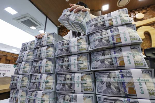 Won Falls Sharply, Nears 1,520 Mark Intraday