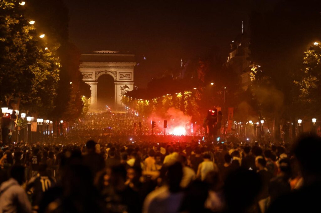 PSG supporters gather on the Champs-Elysees Avenue for celebrations, May 30, 2026. (AFP Photo)