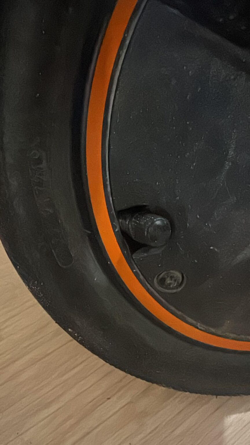 Air leaking from valve area on my Ninebot e-scooter — what should I do?