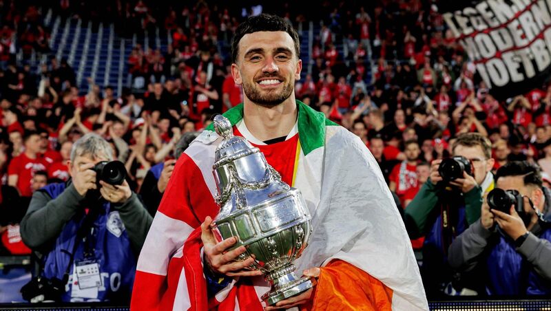 Ireland's Troy Parrott, draped in a tricolour, celeberates AZ Alkmaar's win in the Europjackpot KNVB Beker (Dutch Cup final). Picture: Marcel Bonte/Soccrates/Getty Images