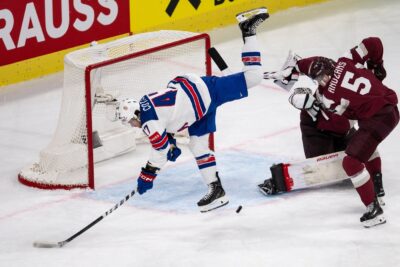 Latvia stuns the US and the Swiss rout Hungary at ice hockey worlds