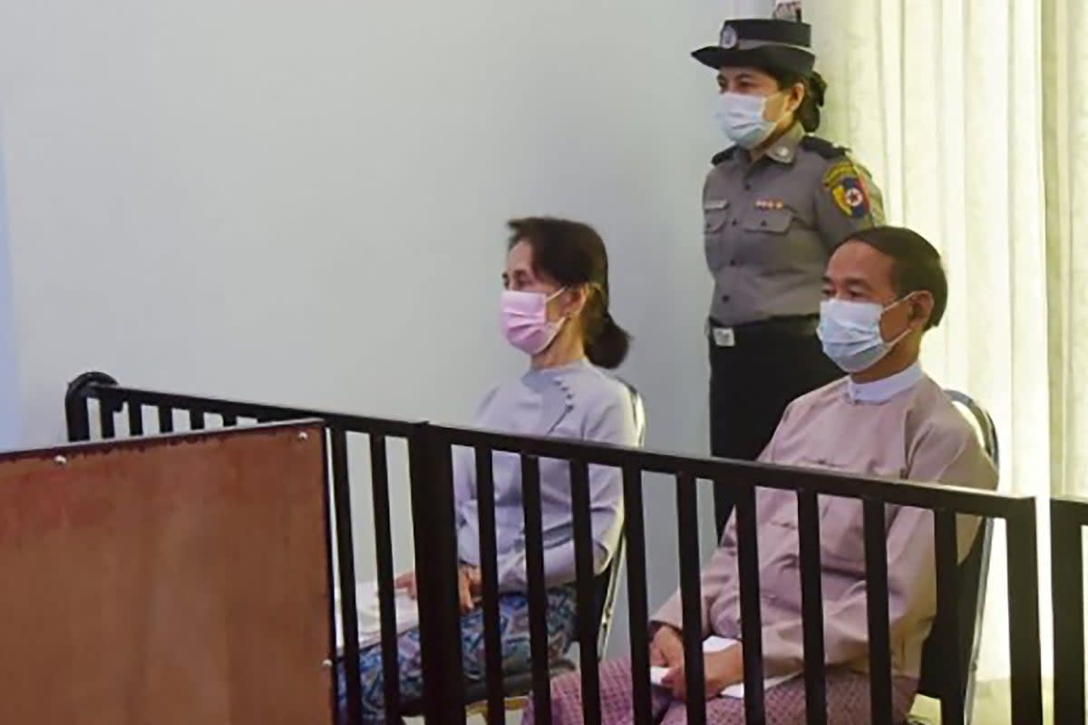 File: Image released by Myanmar in 2021 shows detained civilian leader Aung San Suu Kyi (L) and detained president Win Myint (R) during their first court appearance in Naypyidaw (MYANMAR MINISTRY OF INFORMATION/)