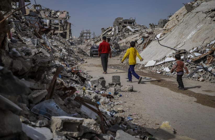 Palestinians live among the ruins of their destroyed homes after returning to the town of Beit Lahia in the northern Gaza Strip, February 8, 2026