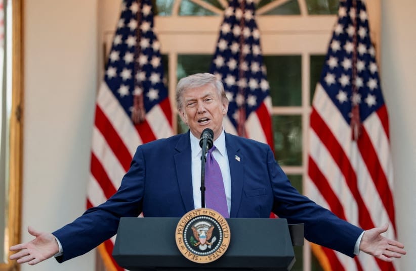 US President Donald Trump gestures while delivering remarks at the White House in Washington, May 11, 2026.