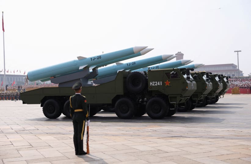A member of the People's Liberation Army stands as the maritime operations group displays YJ-20 hypersonic anti-ship missiles during a military parade to mark the 80th anniversary of the end of World War Two, in Beijing, China, September 3, 2025.