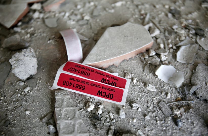 Labels of the Organisation for the Prohibition of Chemical Weapons (OPCW) are seen iside a damaged house in Douma in Damascus, Syria April 23, 2018.