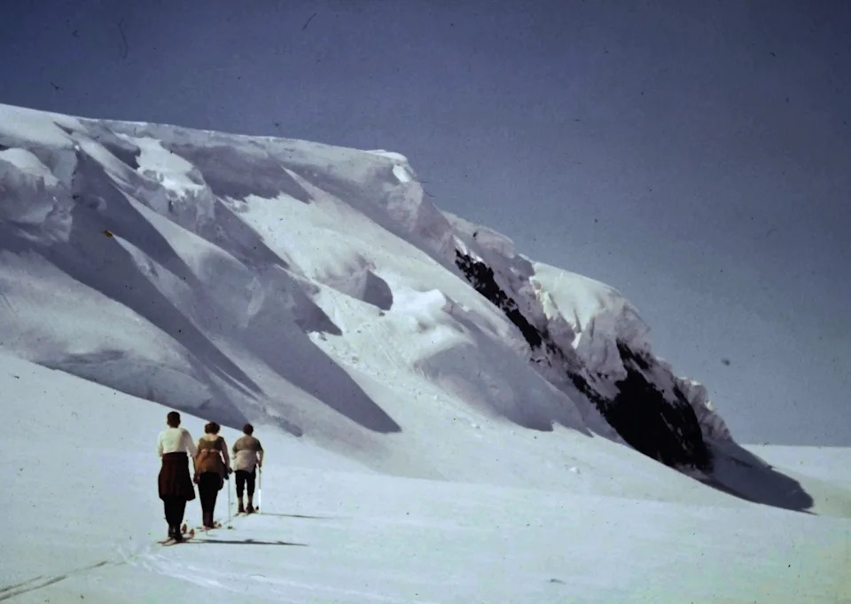Women walk in skis on glacier. Image: Archival Materials Courtesy of Andri Snær Magnason.
