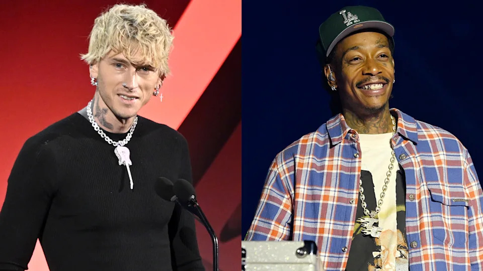 Machine Gun Kelly and Wiz Khalifa side by side; Kelly in black, Khalifa in plaid, both wearing necklaces.
