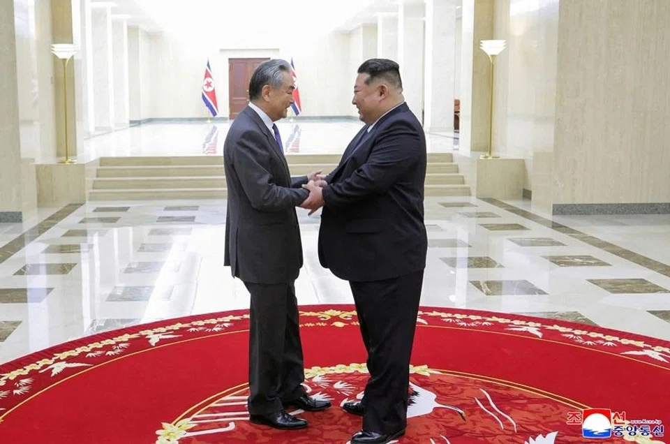 North Korean leader Kim Jong Un shakes hands with China's Foreign Minister Wang Yi as they meet in Pyongyang, North Korea, 10 April 2026, in this picture released by North Korea's official Korean Central News Agency (KCNA).