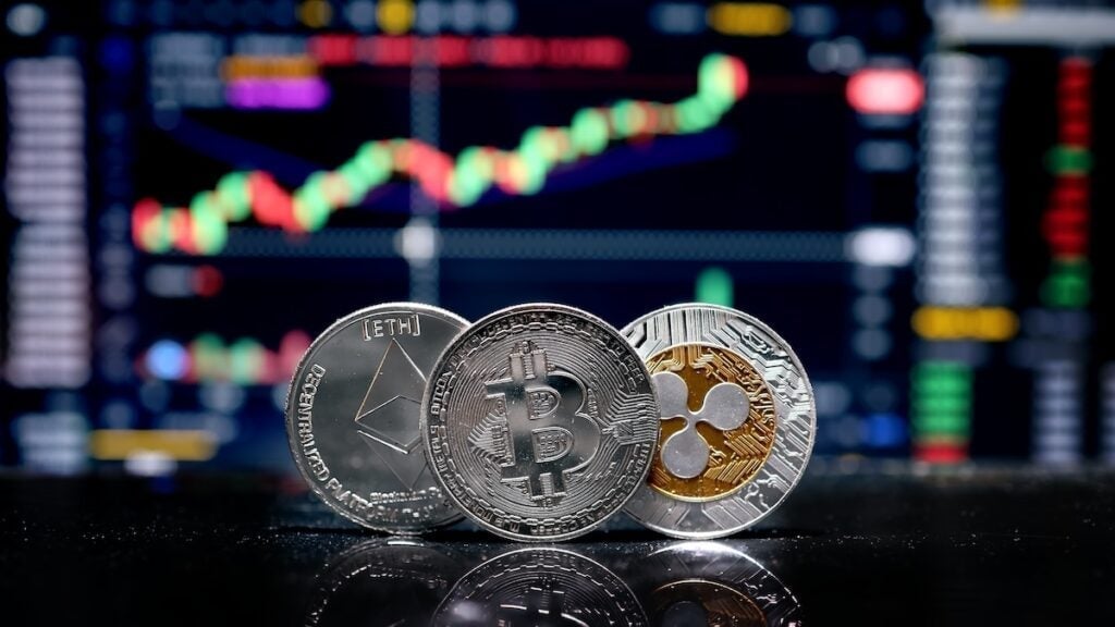 Bitcoin, Ethereum, XRP, Dogecoin Slip As Hot CPI Data Triggers Risk-Off Mood