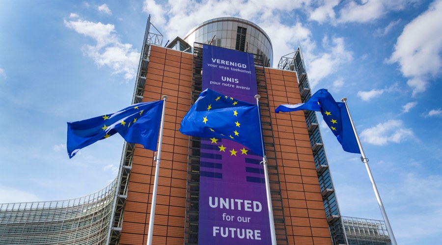 EU flags in front of the European Commission headquarters in Belgium