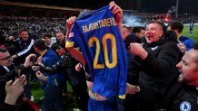 Esmir Bajraktarevic holds his jersey.