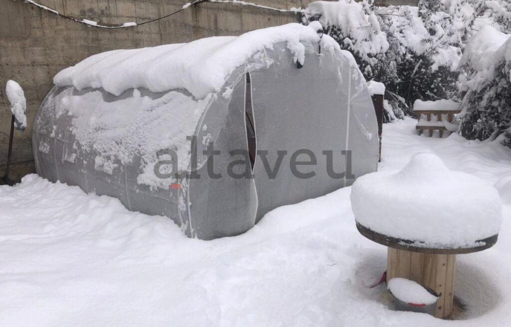 Humble tent among luxury
