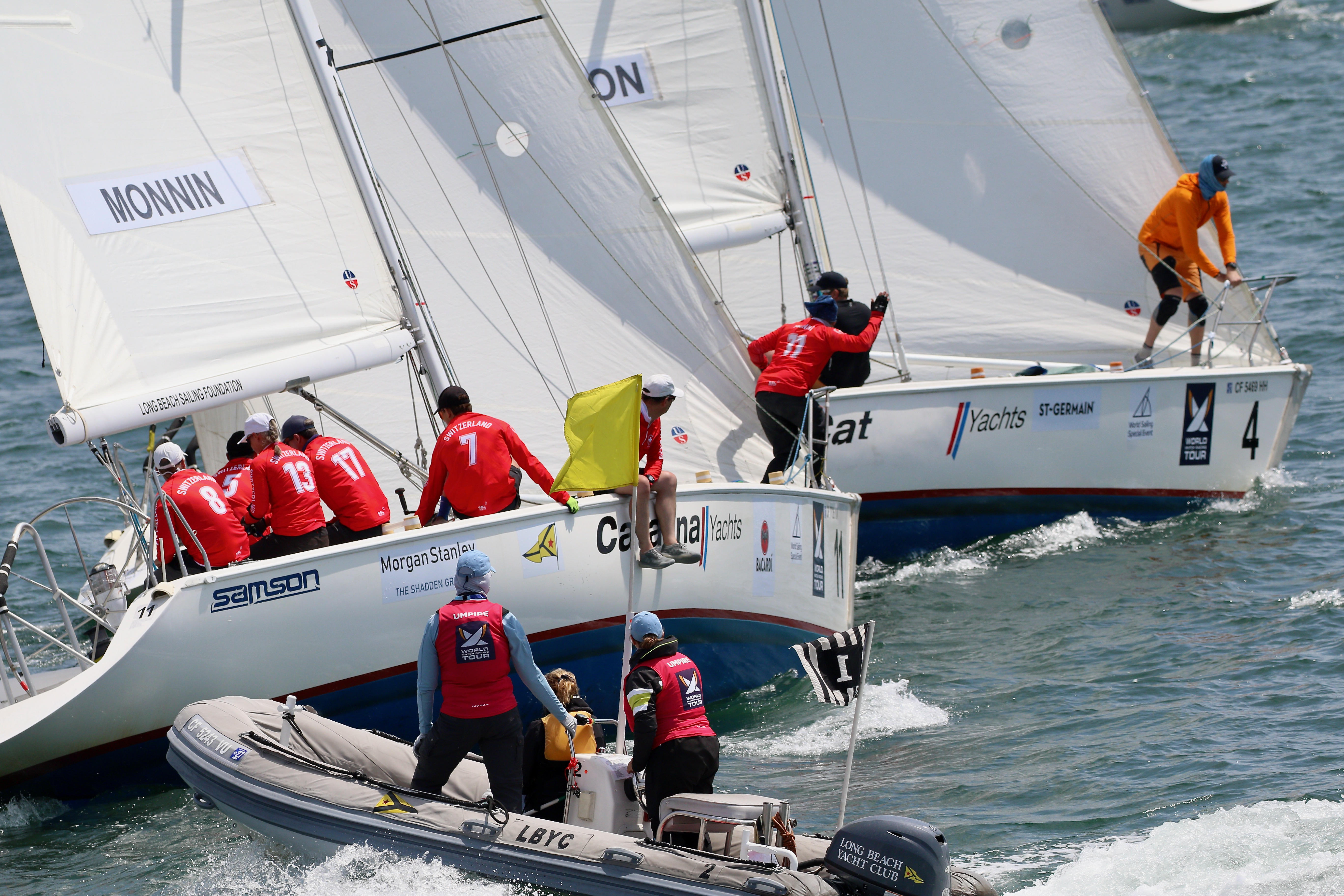 Umpires watch for contact as Eric Monninâs Swiss team closely...