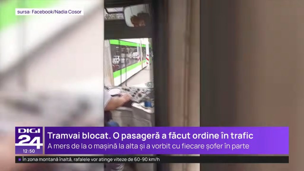Exasperated by the traffic in Bucharest, a woman got off the tram and created order in the traffic