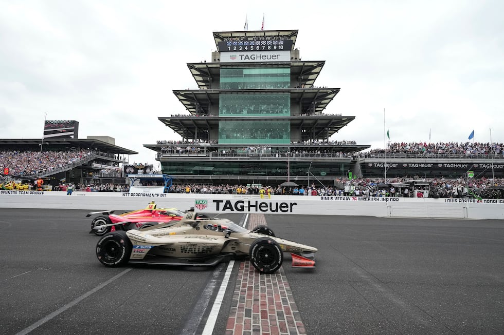 Felix Rosenqvist, foreground, of Sweden, beats David Malukas to the finish line to win the...