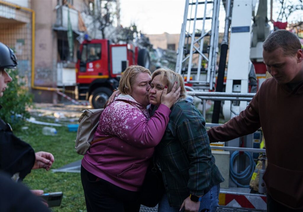 Russia hammers Ukraine for a 3rd straight day, flattening a Kyiv apartment block and killing 9