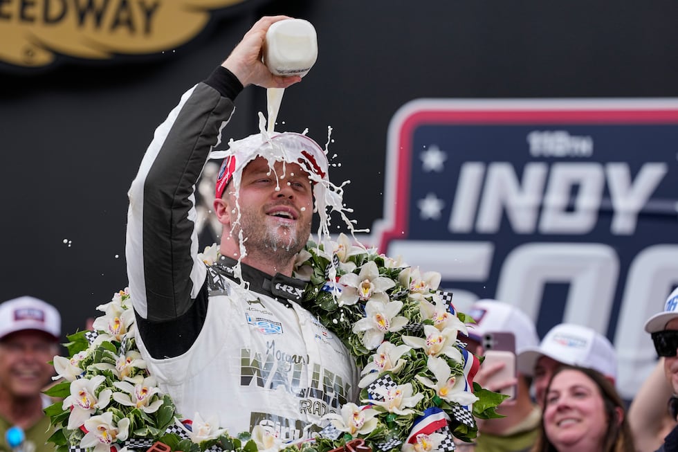 Felix Rosenqvist, of Sweden, celebrates after winning the Indianapolis 500 auto race at...