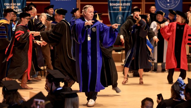 Sonoma State University president Michael Spagna with faculty and staff dance during the College of Science, Technology and Business commencement, Saturday, May 23, 2026, at the Green Music Center in Rohnert Park. (Kent Porter / The Press Democrat)