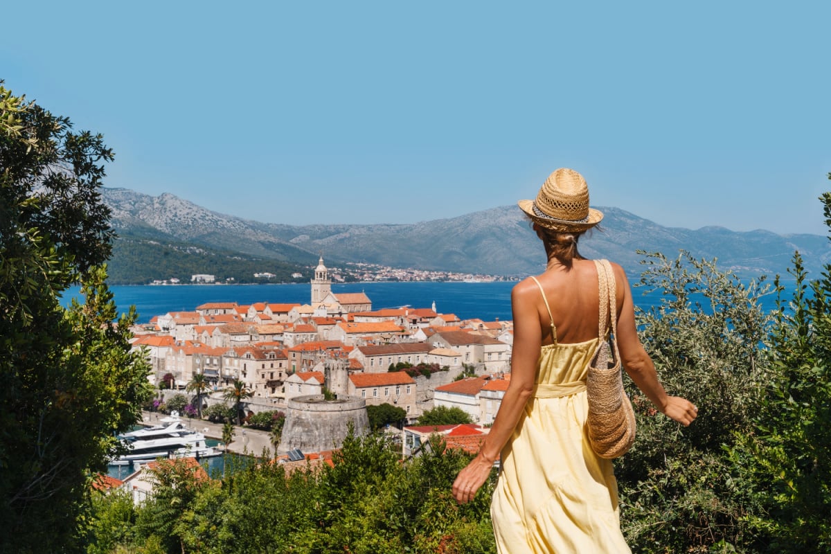 Female tourist enjoying view of Korčula, Croatia