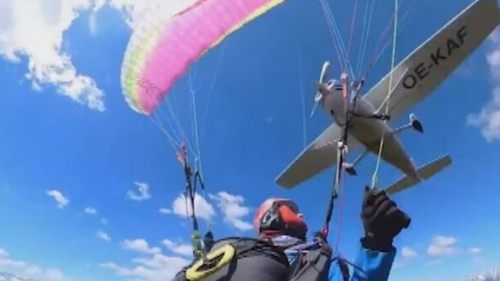 Video shows moment light plane slices through paraglider in Austria Video shows moment light plane slices through paraglider in Austria