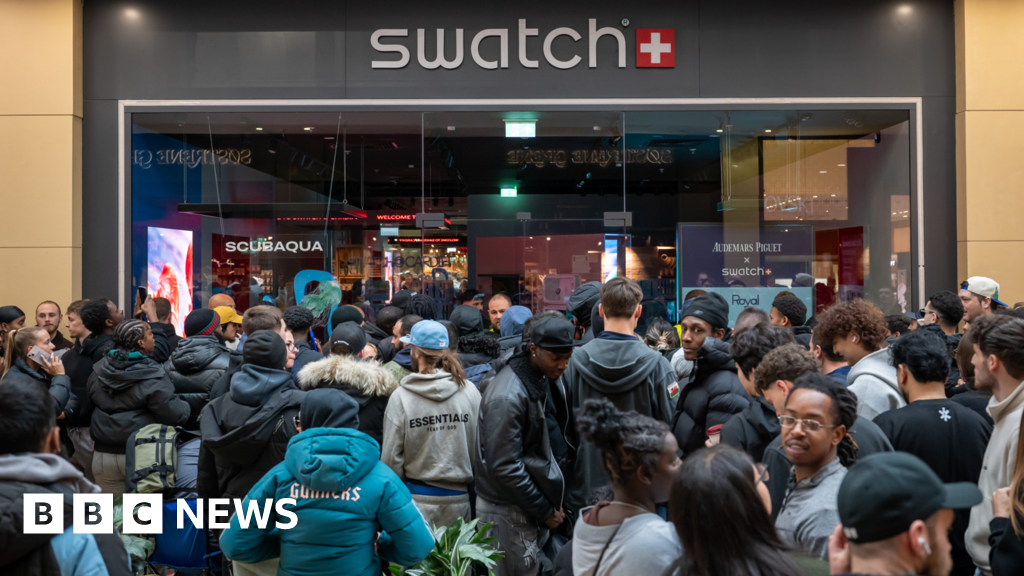Swatch shuts stores after crowds queue for new watch - BBC