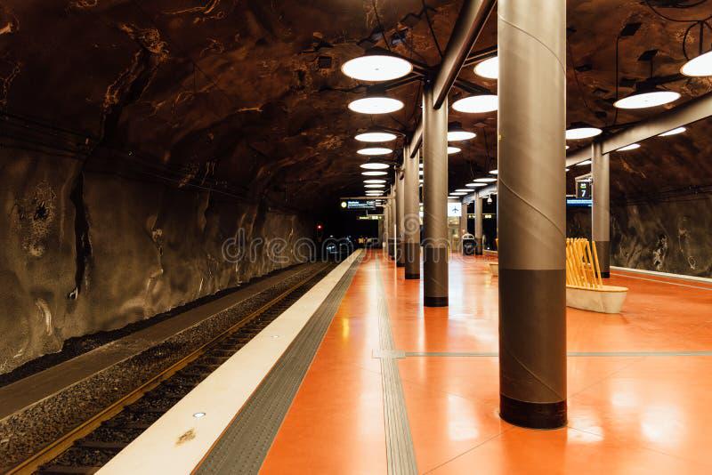 What are the walls of the Arlanda Airport Station made of?