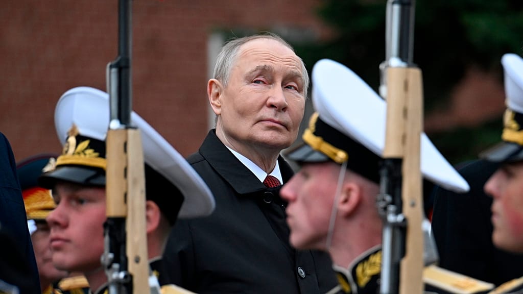 Putin vows victory in Ukraine and targets NATO at Moscow's scaled-back parade