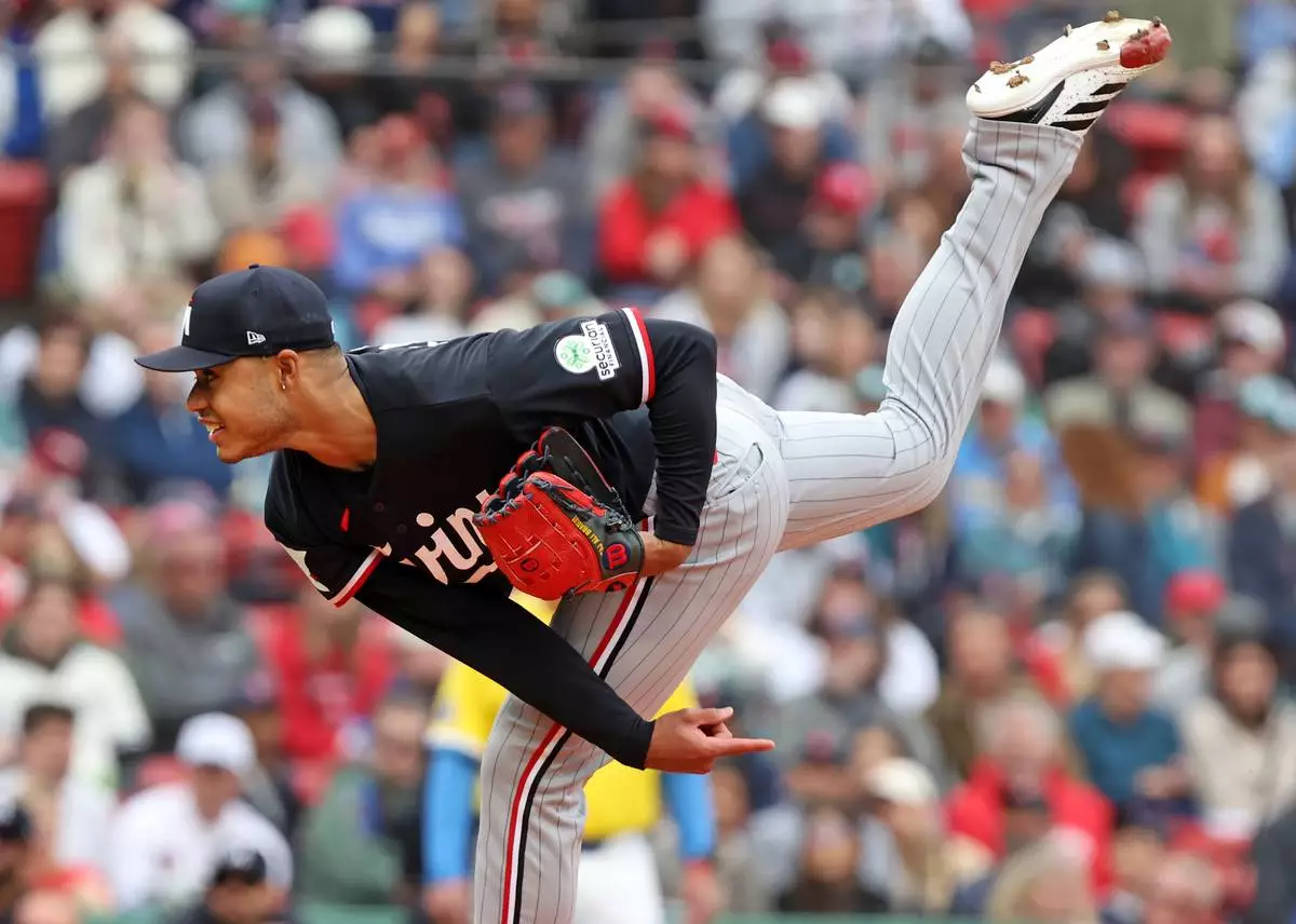 Minesota Twins starting pitcher Taj Bradley throws during the first inning of a baseball game against the Boston Red Sox, Saturday May 23, 2026, in Boston. (AP Photo/Jim Davis)
